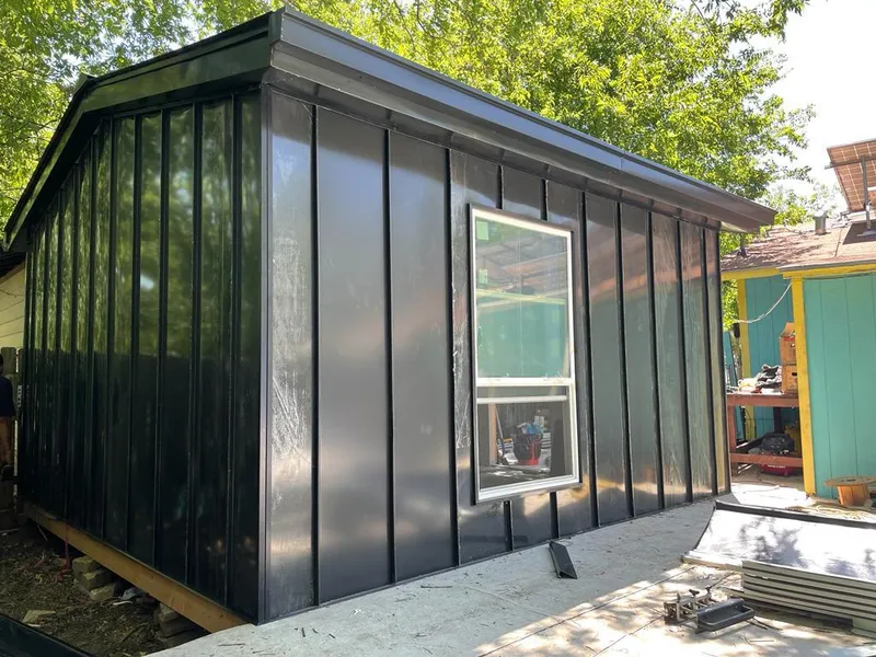 Black standing seam metal wall panels for Metal Roof Installation in Hartford City